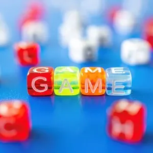 dice that spell "game"