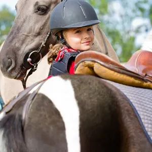 Horse riding - portrait of lovely equestrian
