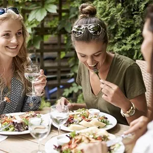 Meeting of girls at the fashion restaurant